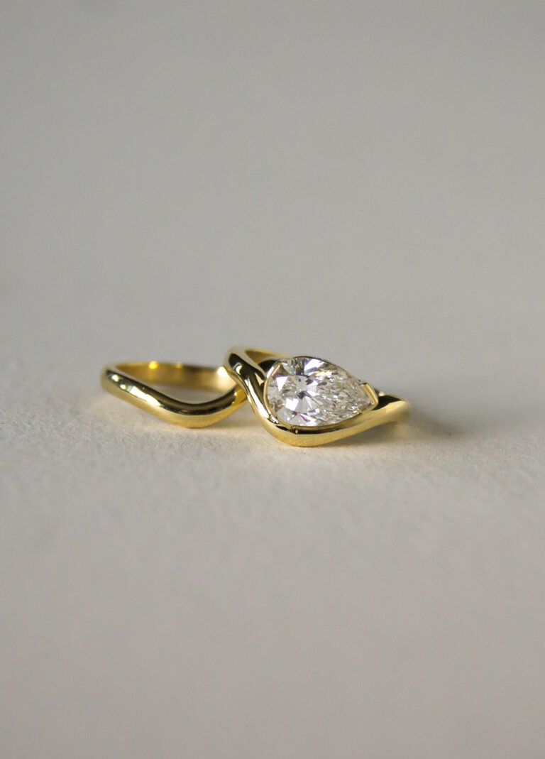 18K Gold East–West Pear-Cut Lab Diamond Ring